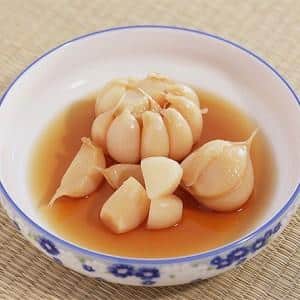 How to prepare pickled garlic cloves for the winter: top 15 simplest and most delicious recipes