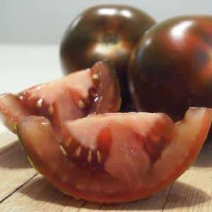 Spectacular appearance and unusual taste: Kumato tomatoes and the secrets of growing them
