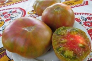 Description of Pineapple variety tomatoes: features of their cultivation in open and closed ground