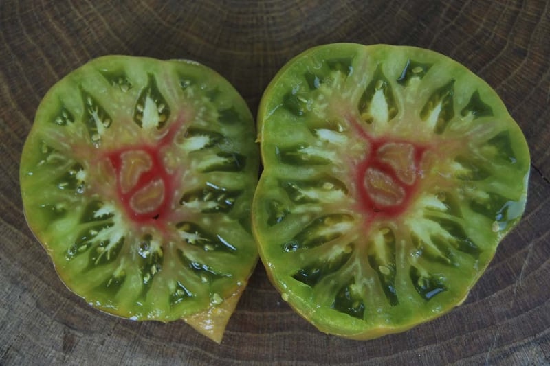 Description of Pineapple variety tomatoes: features of their cultivation in open and closed ground