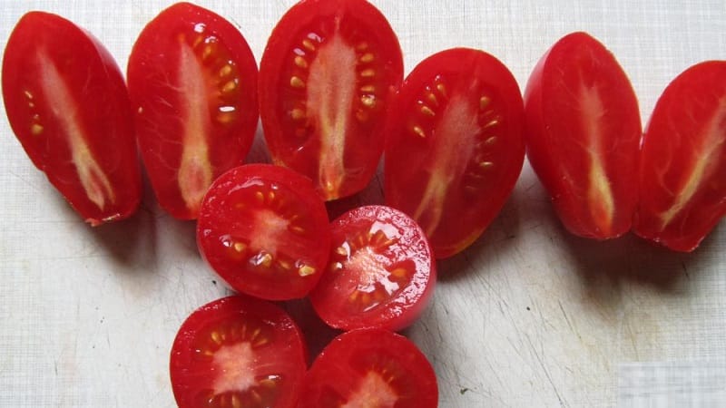 A rich harvest of small plum-shaped tomatoes from each bush - Pink raisin tomato and the secrets of caring for it