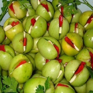 Simple and tasty recipes for pickled green tomatoes: how to properly prepare them and pack them for the winter