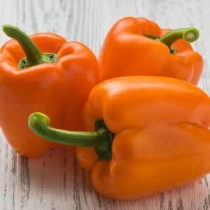 How to feed peppers during flowering and fruiting in a greenhouse to obtain a record harvest