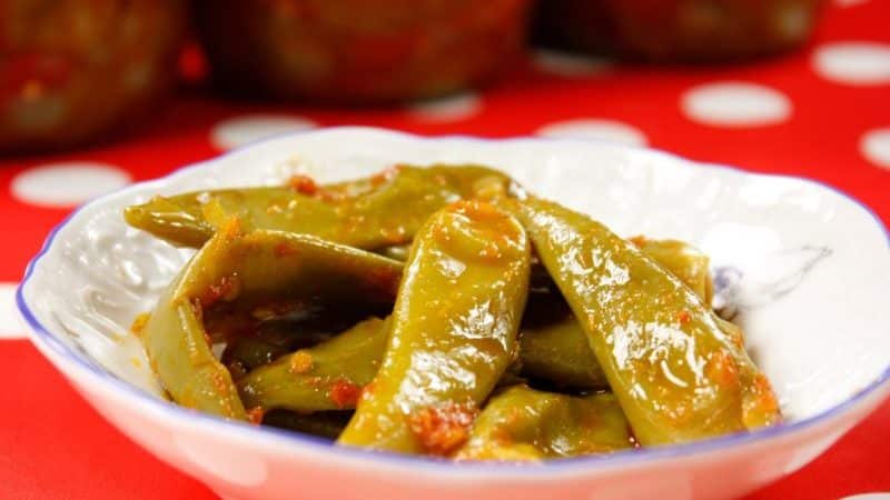 DIY savory snacks: preparing pickled hot peppers for the winter with butter