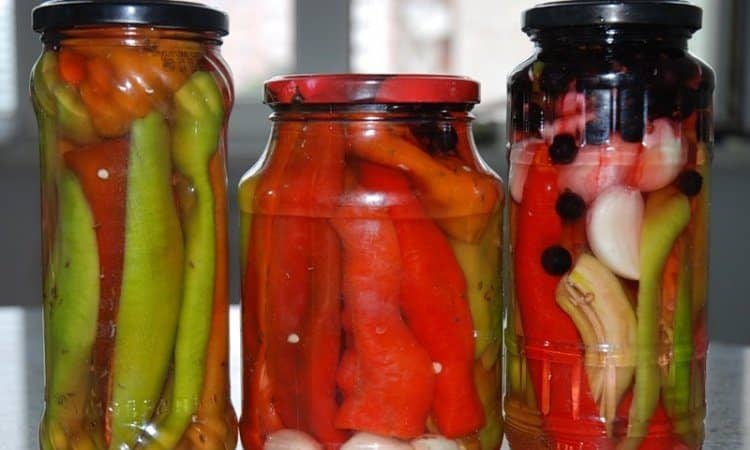 DIY savory snacks: preparing pickled hot peppers for the winter with butter