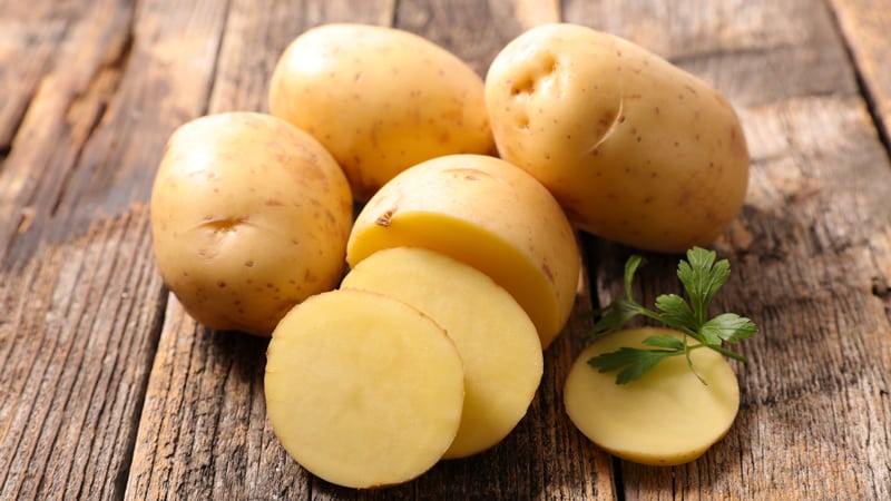 What does raw potatoes help with and can you eat them?