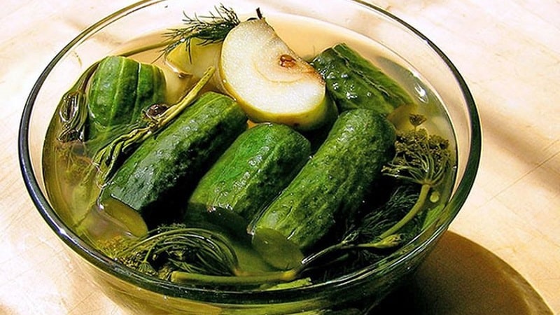 Classic recipe for lightly salted cucumbers in a pan with hot brine