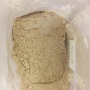 How is flour made from whole grain wheat and where is it used?