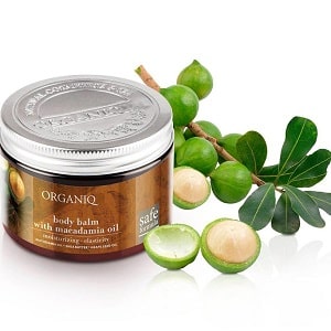 Where and how does macadamia nut grow and how is it used?