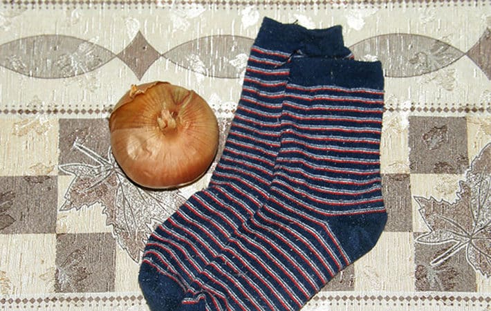 Using onions in socks for medicinal purposes